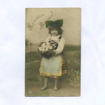 Открытка пасхальная "Христос Воскресе!" Девочка с зеленым бантом и корзиной яиц. Изд. PH. Германия 1907 г.