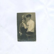 Фото. Студент в фуражке и дама в шляпке-тюрбан. 1900-е гг.